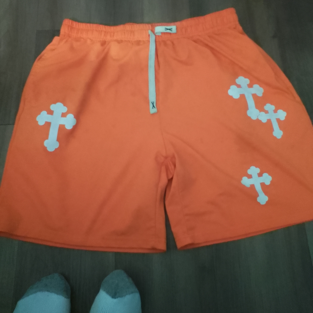 Men's Athletic Shorts in Bright Orange with Cross Design